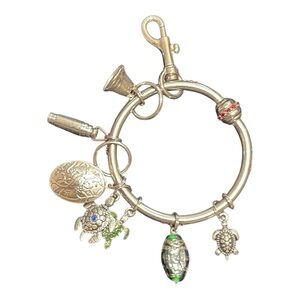 Green Rhino Key Charm Bracelet Turtles Whistle Locket Bell Gem